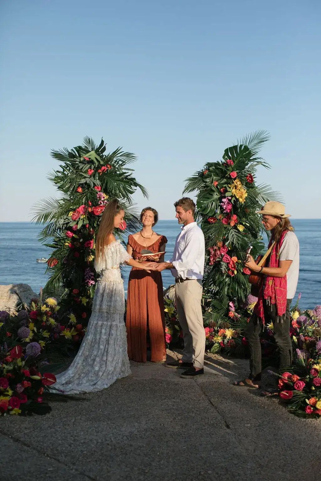 A tropical-flower ceremony above the sea