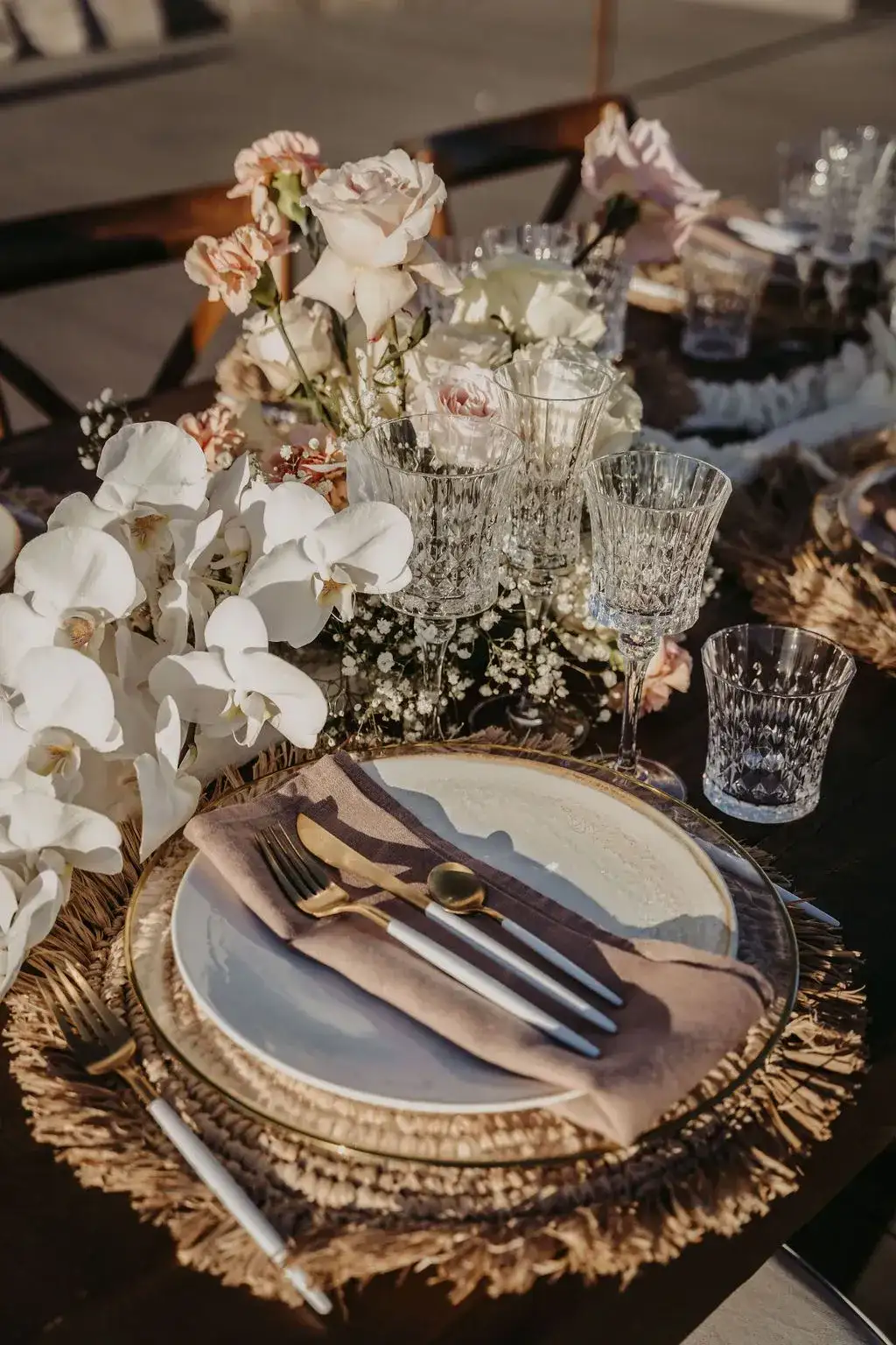 Orchids and crystal on rattan chargers, 7Pines Ibiza