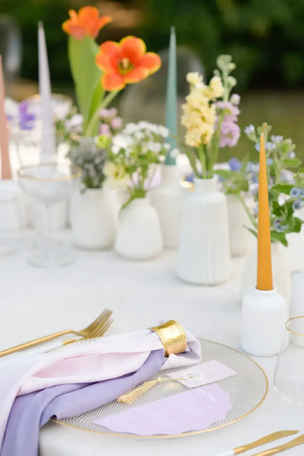 Lilac napkins, gold cutlery and spring flowers, spring styled shoot
