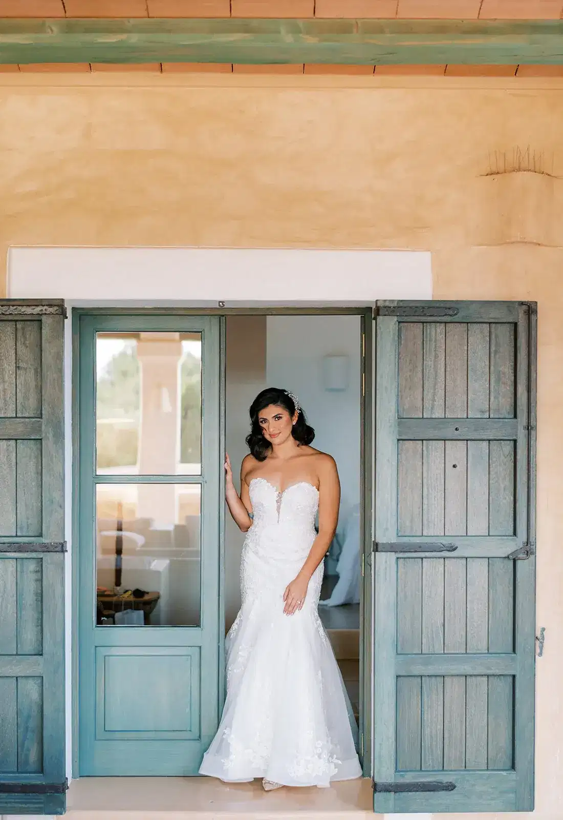 The bride in a blue doorway, Nikki Beach Ibiza