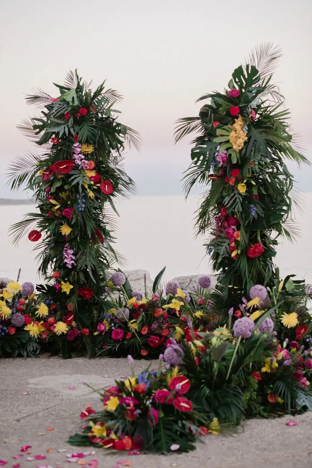 Two tropical flower columns above the sea