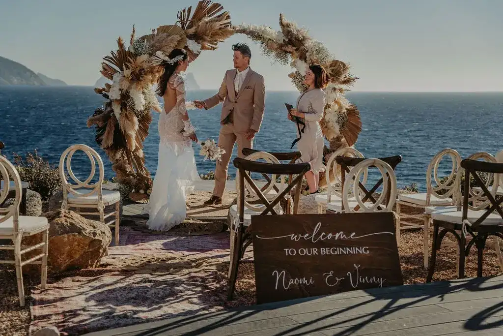 Vows at the pampas arch above the sea, 7Pines Ibiza