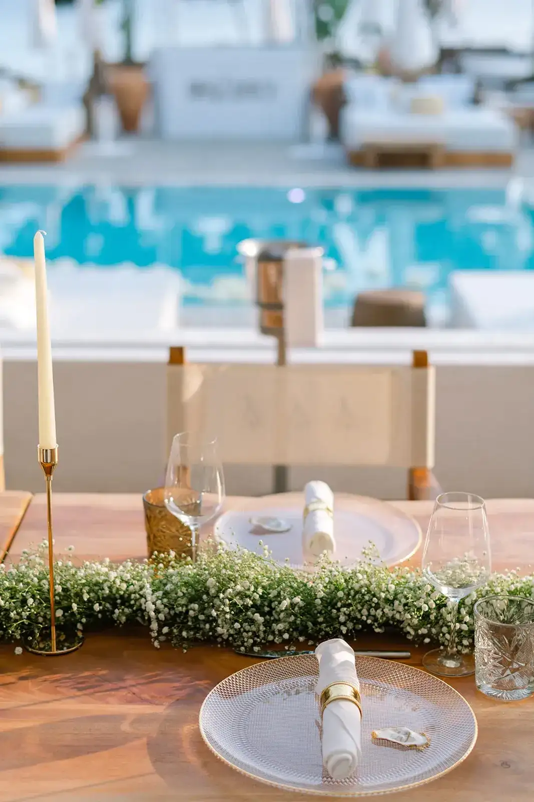 A gold napkin ring and greenery on a beach club table, Nikki Beach Ibiza