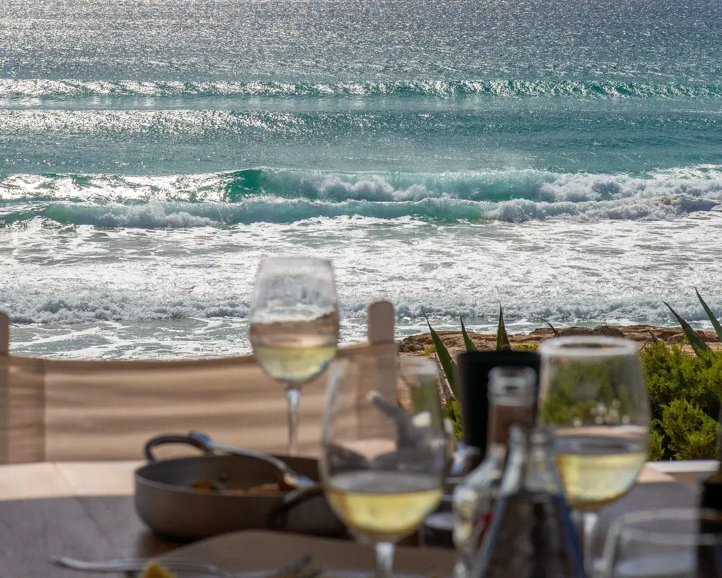 10.7 Formentera: Table on the terrace looking over the waves of Migjorn
