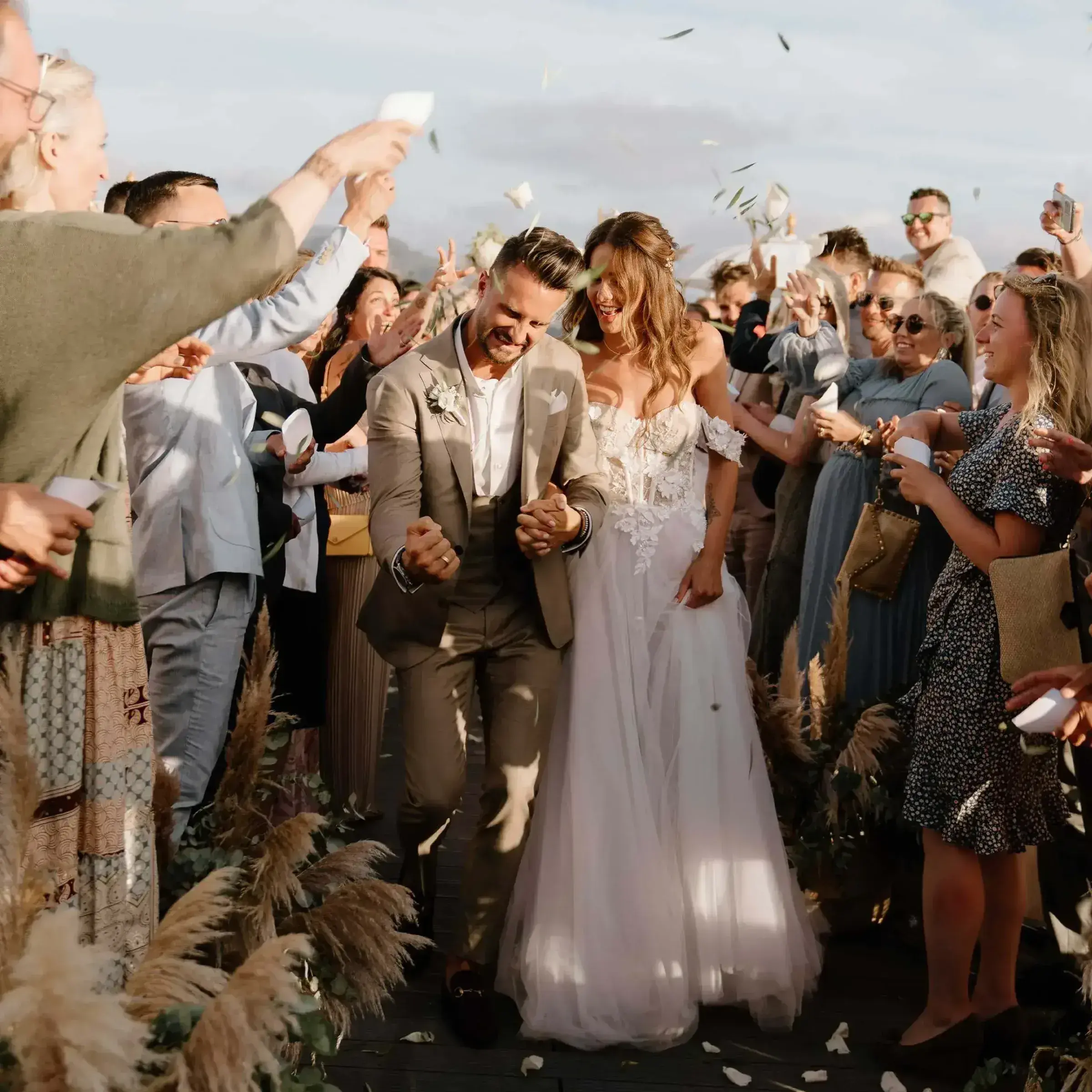 7Pines Resort Ibiza: Newlyweds walking through cheering guests after the ceremony