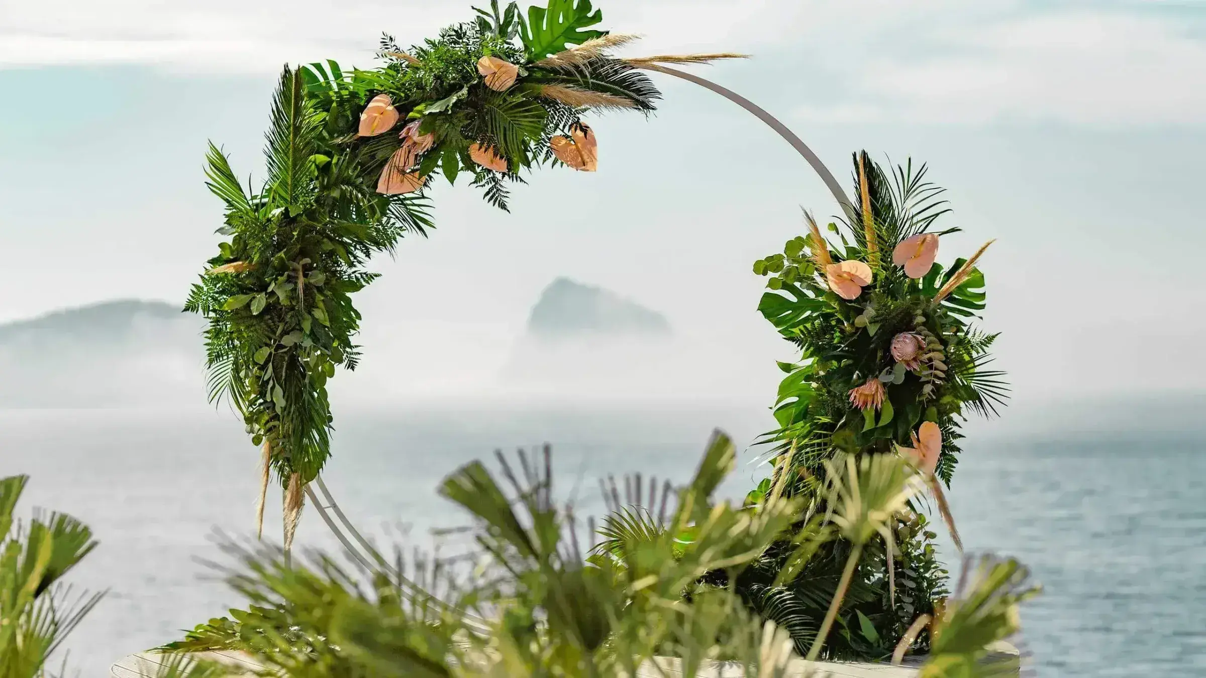 7Pines Resort Ibiza: Round floral ceremony arch overlooking the coast