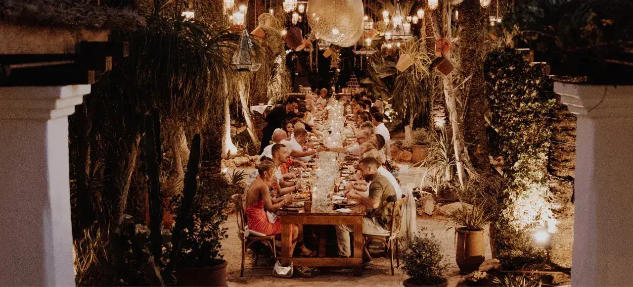 Agroturismo Atzaró: Evening dinner at long tables among trees and lanterns