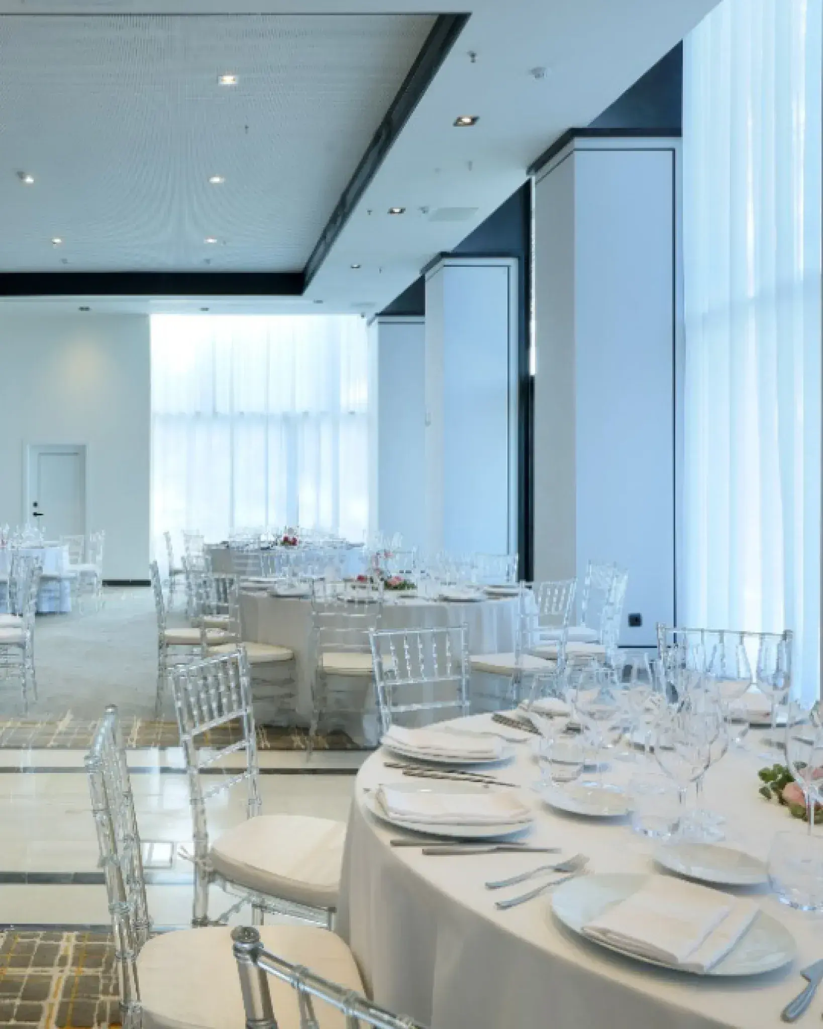 Bless Hotel Ibiza: Indoor event room set with round tables and white linen