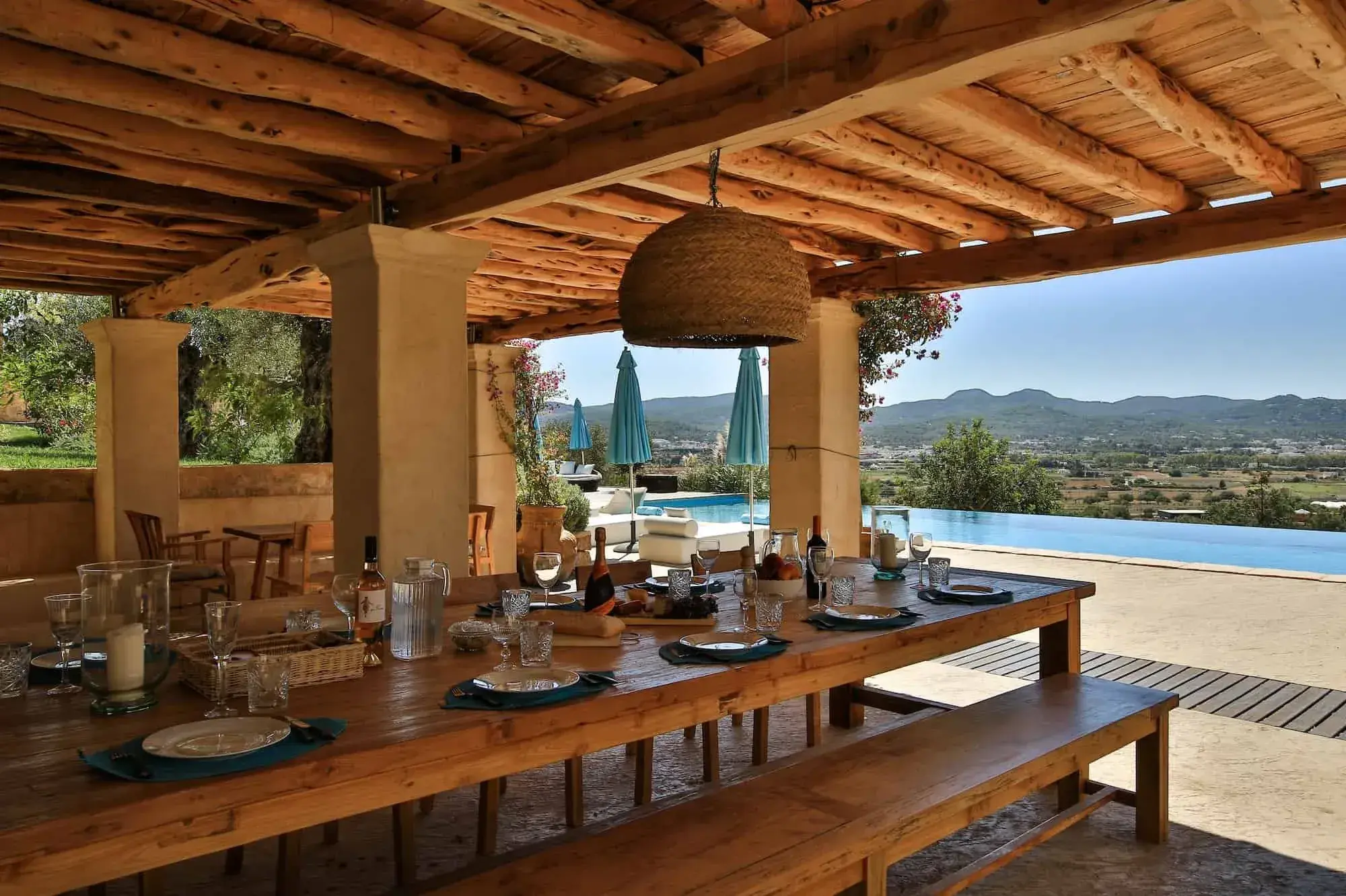 Can Frare: Beamed outdoor dining terrace beside the infinity pool