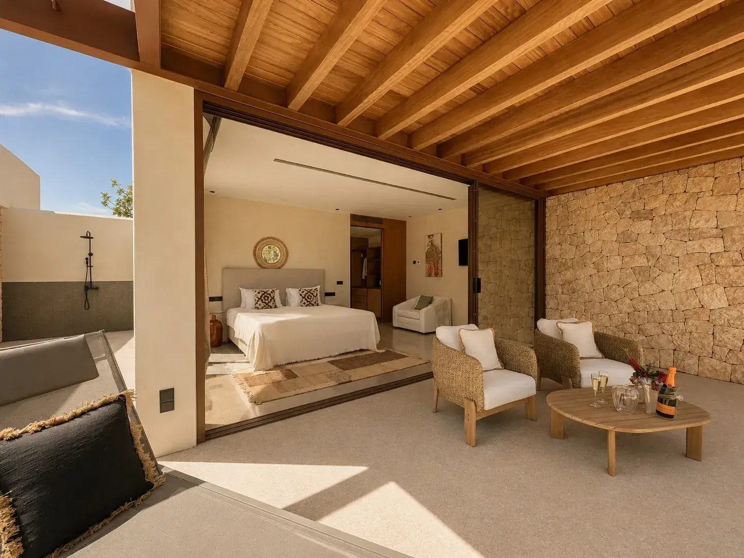 Can Skye Ibiza: Suite terrace with stone wall, timber pergola and open bedroom