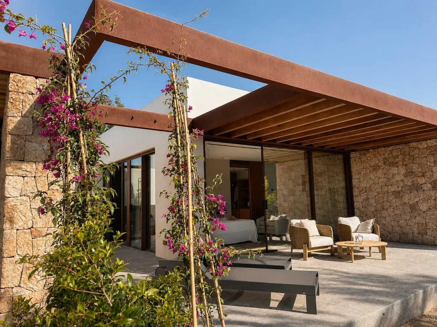 Can Skye Ibiza: Suite exterior with stone walls and bougainvillea on the pergola