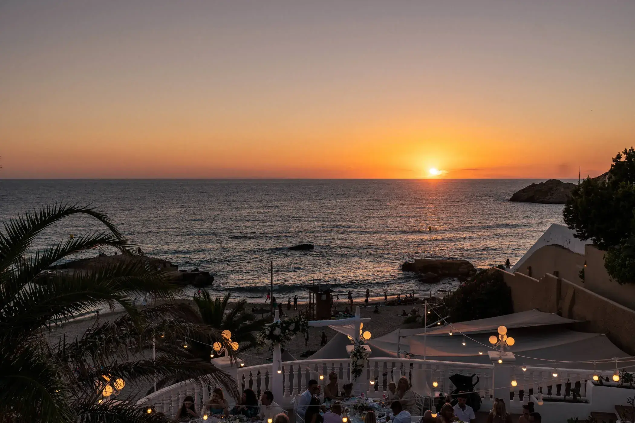 Cas Milà: Sunset over the sea from the restaurant terrace