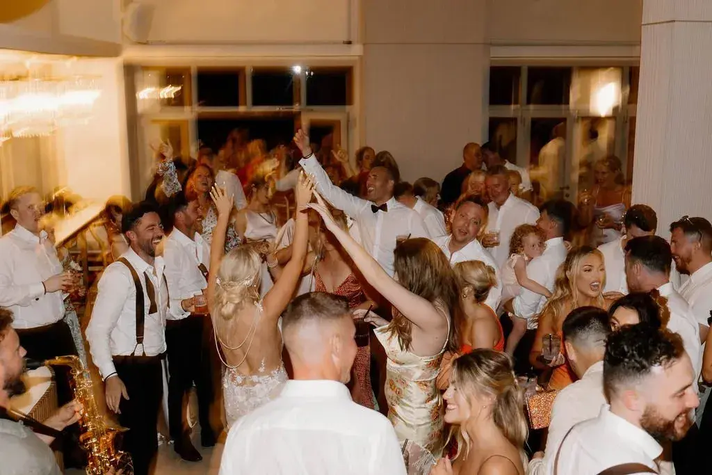 Elixir: Guests dancing in the indoor party room