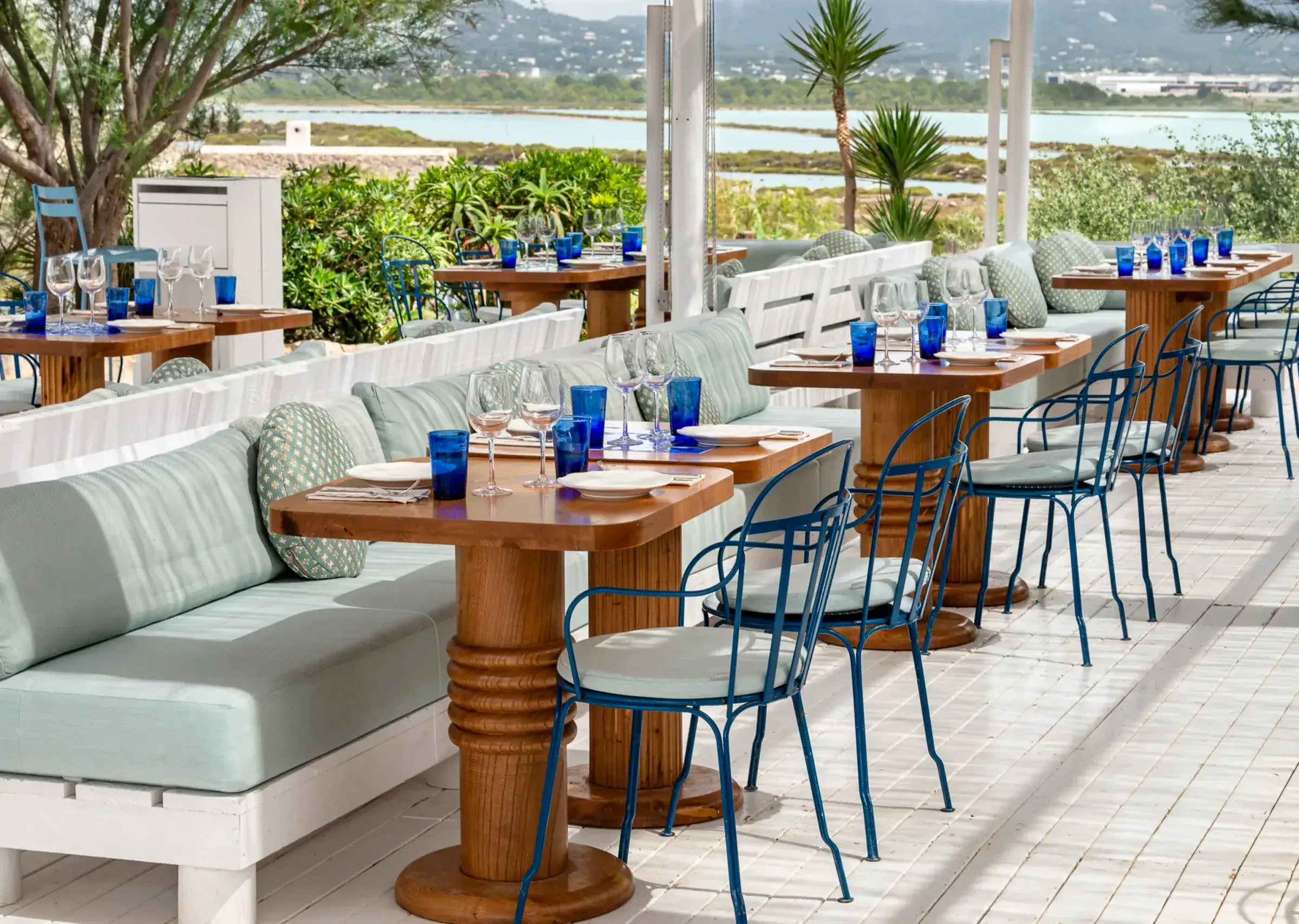 Experimental Beach: Restaurant terrace with sage banquettes facing the salt flats