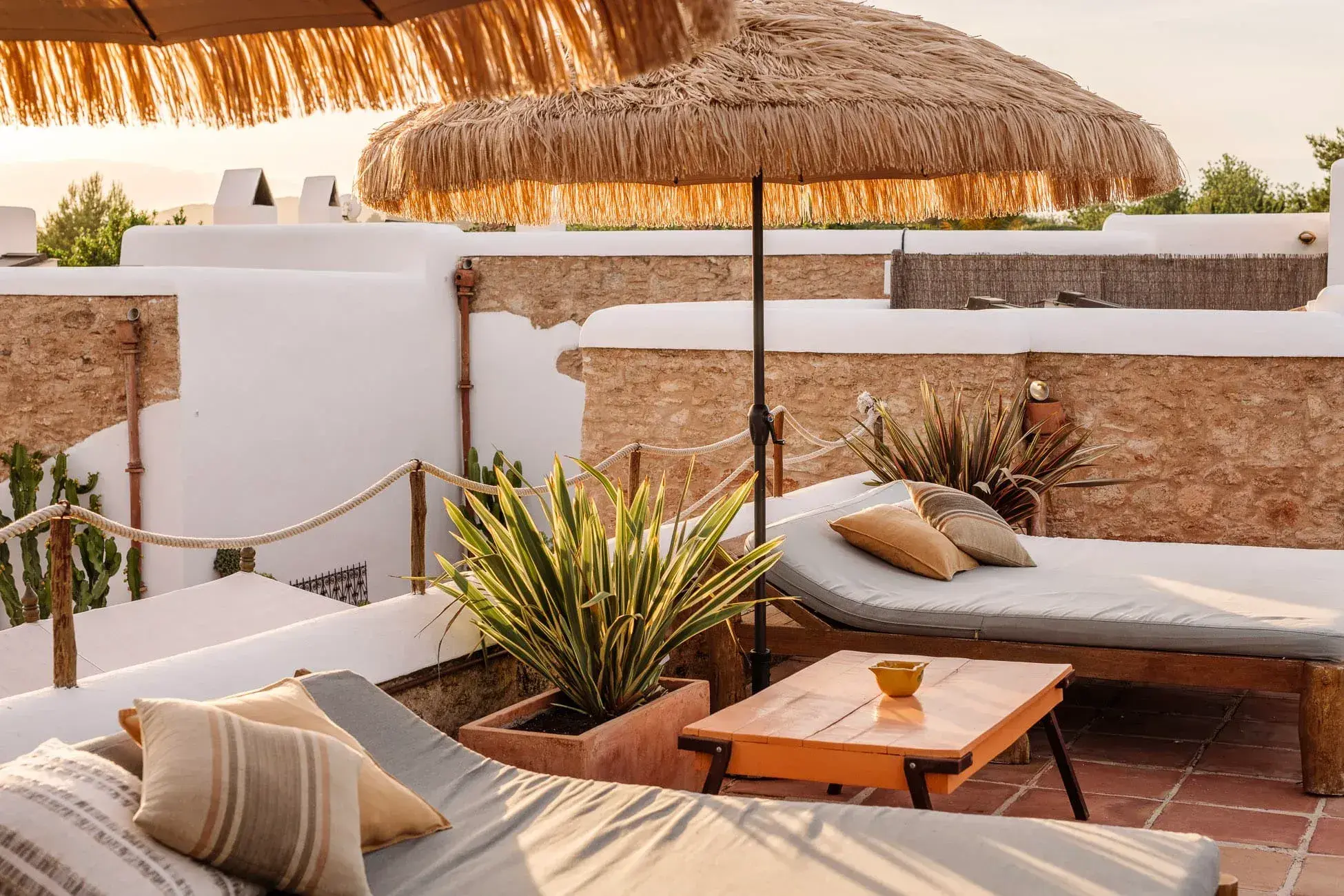 Las Cicadas: Pool terrace with thatched parasol and sunbeds