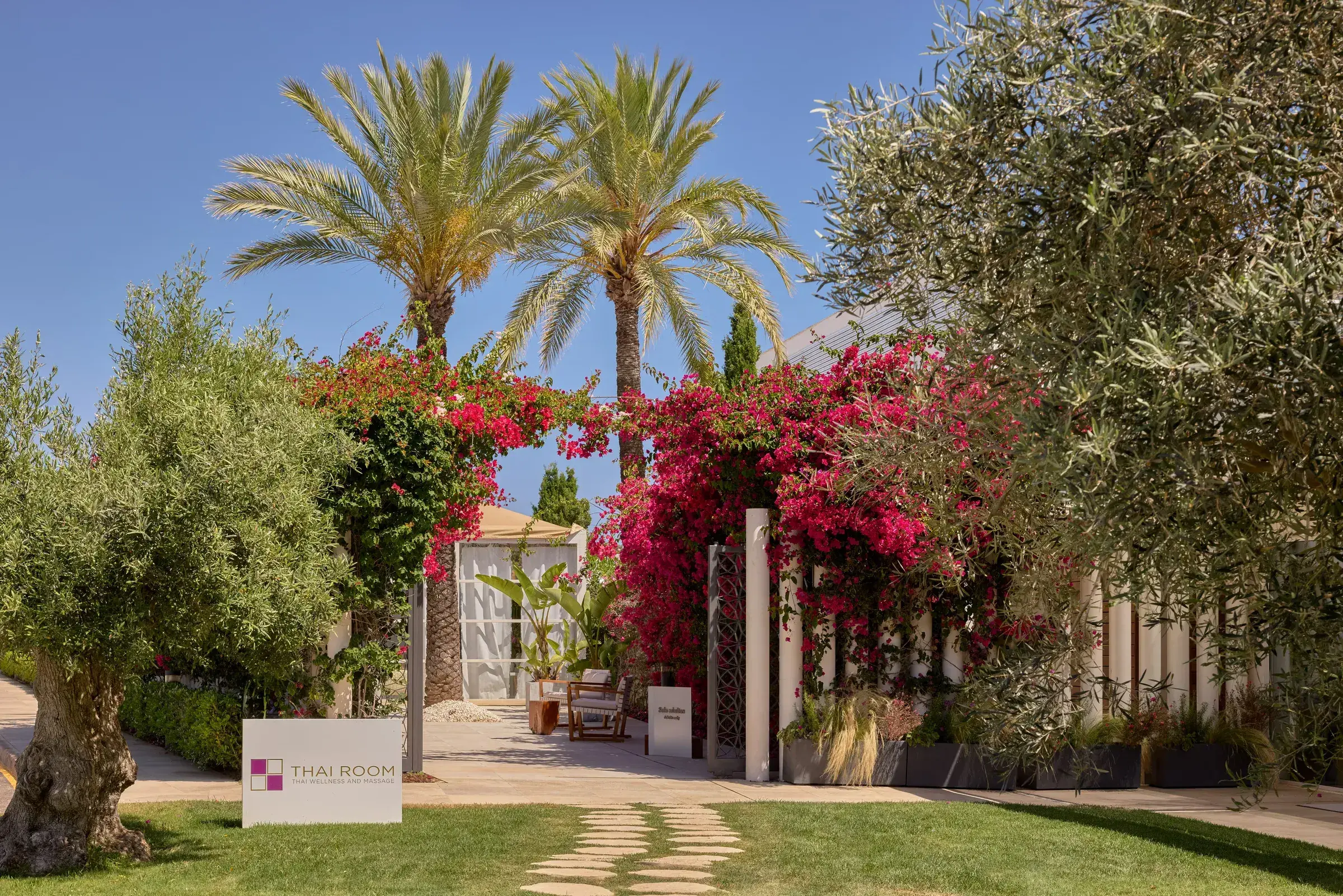 ME Ibiza: Garden with olive trees, palms and bougainvillea