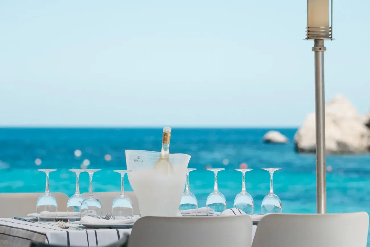 Port Balansat: Table set with glasses and champagne bucket facing the sea