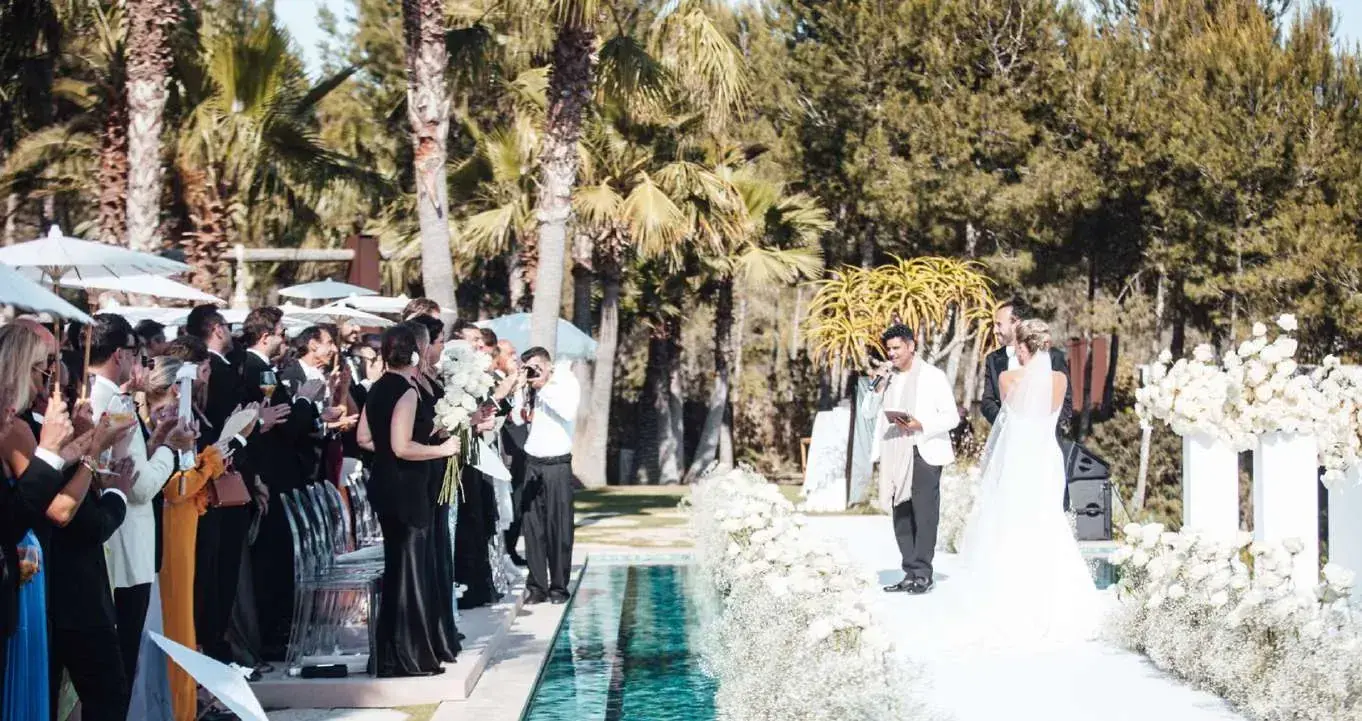 Guests seated for a villa ceremony