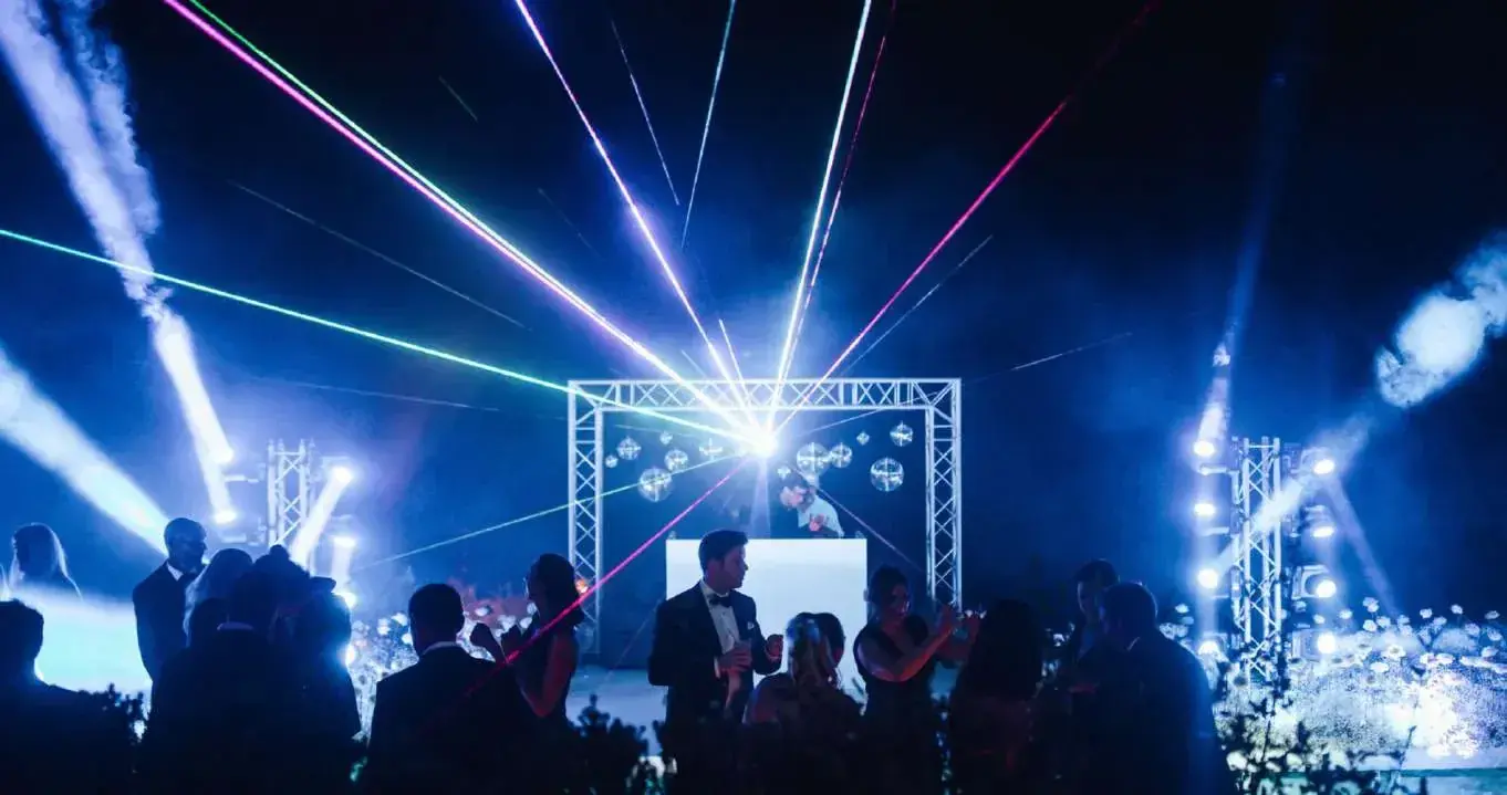 Late-night villa party with lights