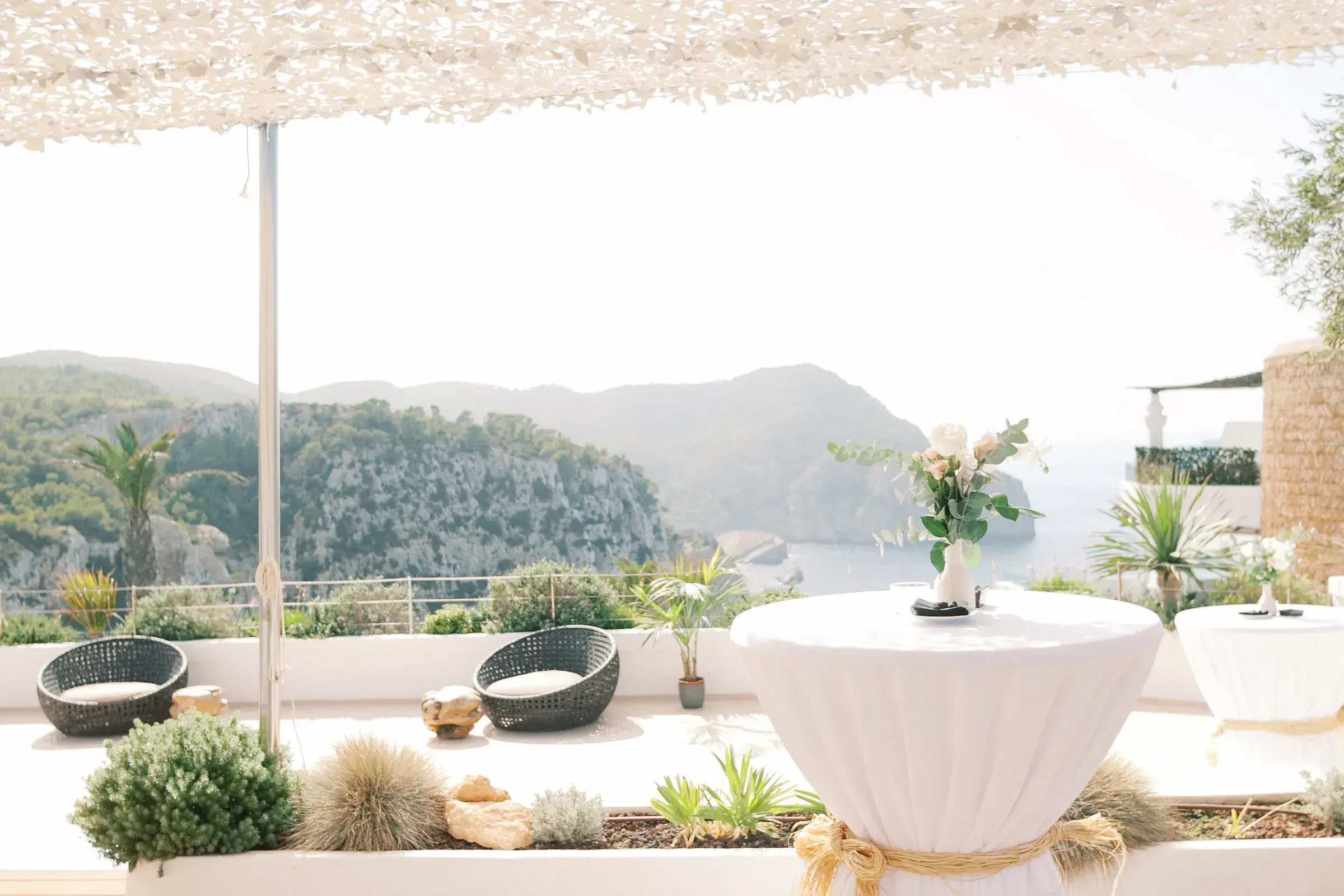 Hacienda Na Xamena: Rooftop terrace set for the cocktail with sea and cliff views