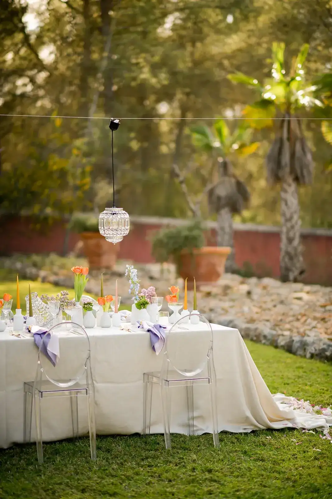 A garden table with lilac napkins, spring styled shoot