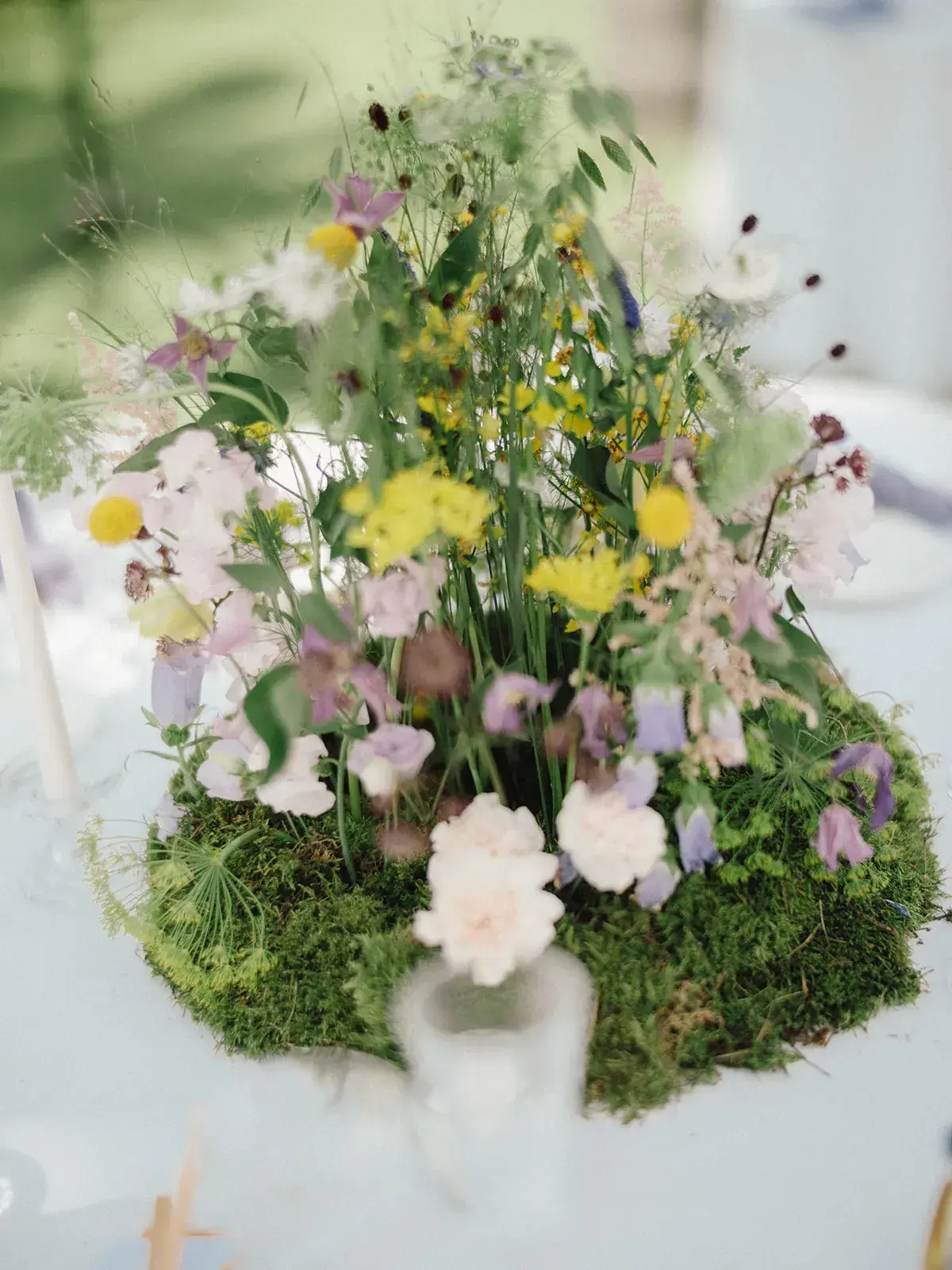 A wildflower and moss centrepiece, Can CG