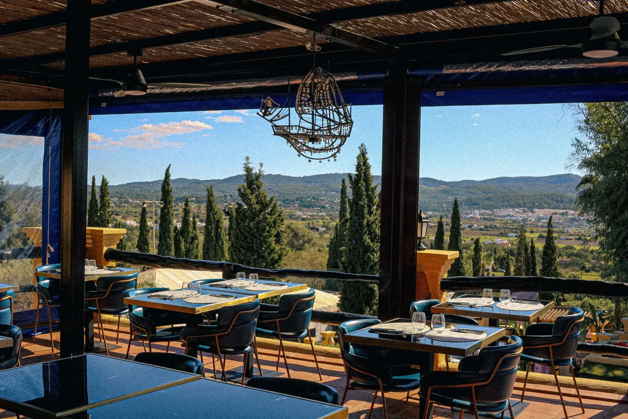 Pikes: Covered restaurant terrace with tables and country views