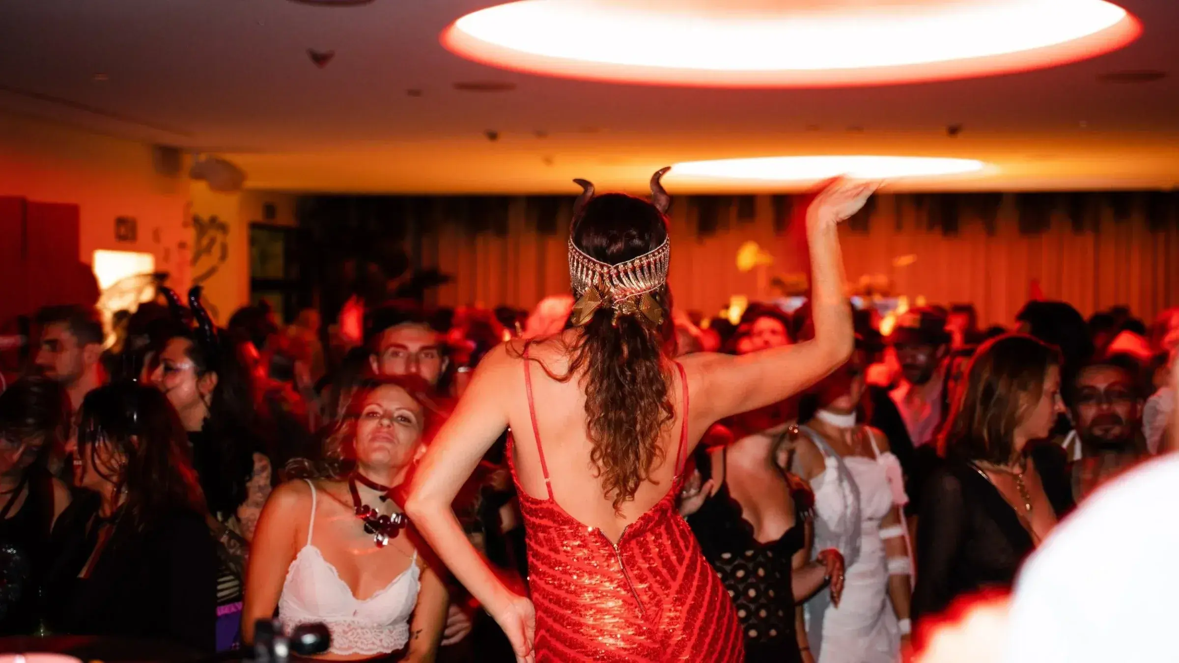 The Standard Ibiza: Private party in full swing in a red-lit room